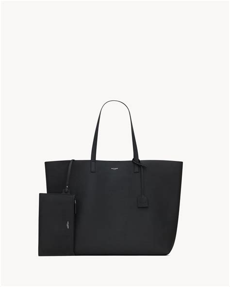 Bold East/West shopping bag in grained leather .